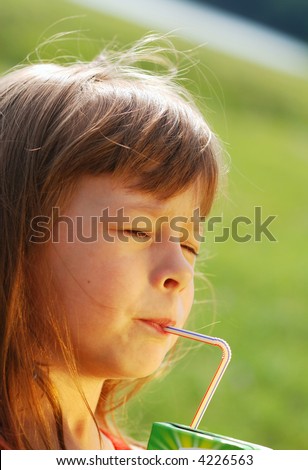 stock-photo-little-cute-girl-drinking-juice-4226563.jpg