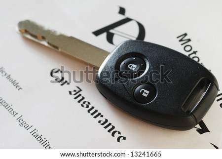 Car key on an insurance policy