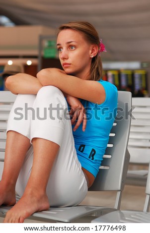 Woman waiting for a delayed flight