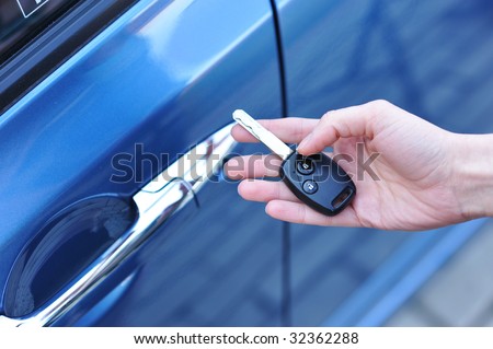 Car key in woman\'s hand