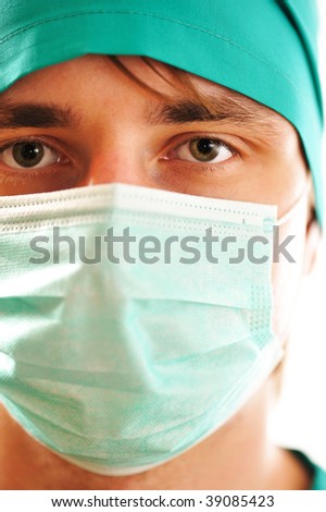 Doctor's face in mask close-up