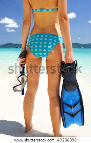 Snorkel woman at caribbean beach