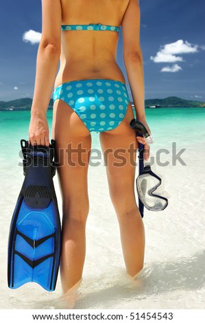 Snorkel woman at caribbean beach