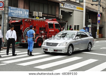 KYOTO, JAPAN - JULY 28 : Kyoto City Fire Department at work on July 28, 2010 in Kyoto, Japan.