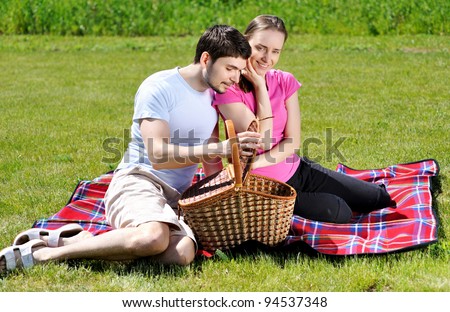 Couple on picnic at sunny day