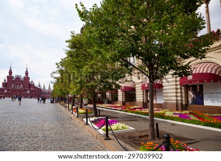 MOSCOW - JULY 7, 2015: Flower Festival near GUM (main department store) on the Red Square. GUM - one of the oldest supermarkets in Moscow.