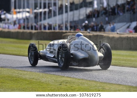 GOODWOOD, UK - JULY 1: The Mercedes - Benz W125 car drives up the Festival of Speed hill course at Goodwood, UK on July 1, 2012
