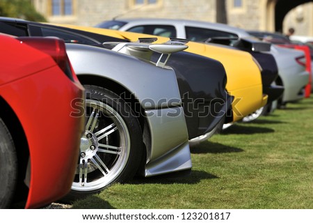 UNITED KINGDOM - SEPTEMBER 13: Selection of Supercars on display at the United Kingdom Concours d\'elegance Classic Car Expo at Windsor Castle on September 13, 2012 in Windsor, United Kingdom.