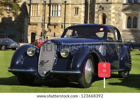UNITED KINGDOM - SEPTEMBER 13: A classic Alfa Romeo on display at the United Kingdom Concours d\'elegance Classic Car Expo at Windsor Castle on September 13, 2012 in Windsor, United Kingdom.