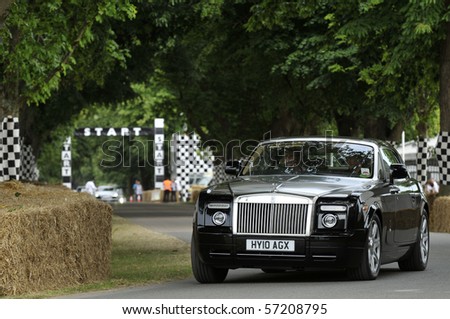 GOODWOOD, UNITED KINGDOM - JULY 3: Rolls Royce drives up the hill at the Goodwood Festival of Speed in the United Kingdom on July 3rd 2010 in Goodwood, UK