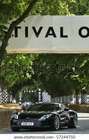 GOODWOOD, UNITED KINGDOM - JULY 3: Aston Martin One 77 drives up the hill at the Goodwood Festival of Speed in the United Kingdom on July 3, 2010 in Goodwood, UK