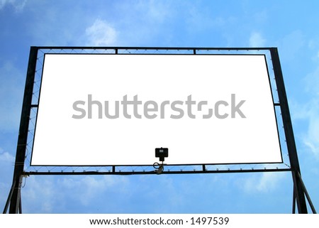 Blank billboard with a blue sky background - white copyspace for your ad
