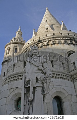 Statue of a medieval soldier in front of Fisherman\'s Bastion (Halaszbastya) in Budapest