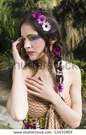 stock photo portrait of beautiful hippie girl with a look of shyness