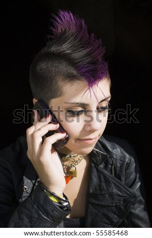 stock photo portrait of punk girl talking on the phone