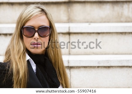 Executive beautiful woman, with her sunglasses