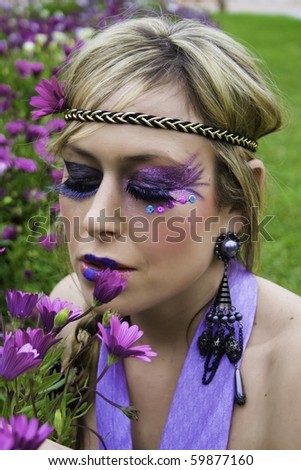stock photo pretty young hippie girl surrounded by flowers