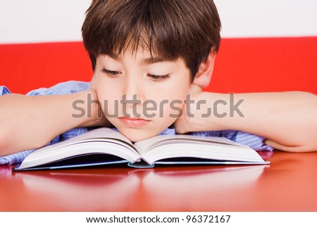 Kid reading a book