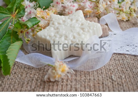 bars of soap with flowers on sacking cloth