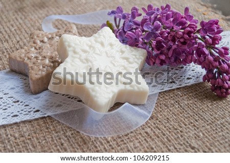 handmade soap with flowers on sacking cloth