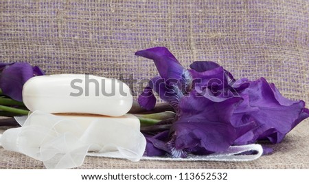 pieces of soap with flowers on sacking cloth