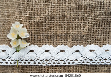 jasmin in a crocheted ribbon on vintage cloth