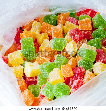 close up of assortment of colorful candy in plastic bag