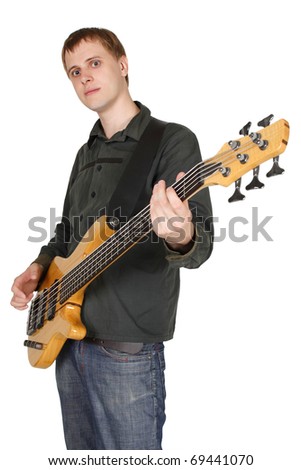 young caucasian man with bass guitar, half body, looking at camera, isolated