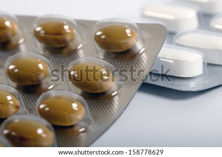 Tablets on the table. Medicine symbol.