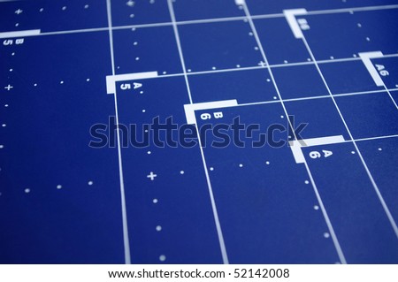 Blue desk background with paper formats
