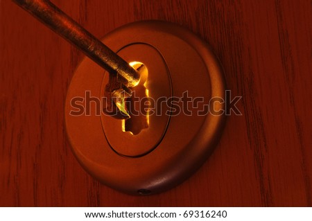 Key and light passing through a keyhole