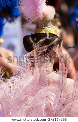 Bristol, UK. 5th July 2014. Girl wearing plumes and feathers at St. Paul\'s carnival