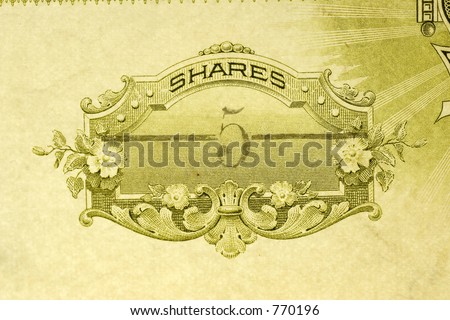 Macro shot of antique stock certificate for five shares
