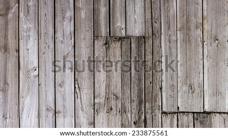 background of weathered barn wood in need of repair