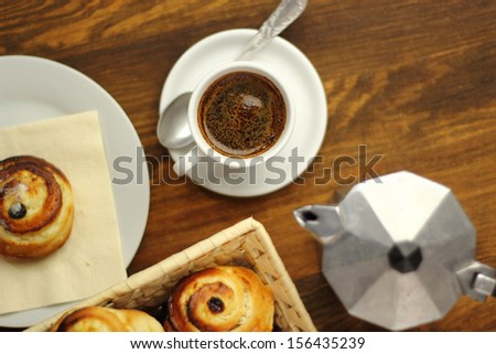 Coffee Cup and Bread Roll. Continental Breakfast.
