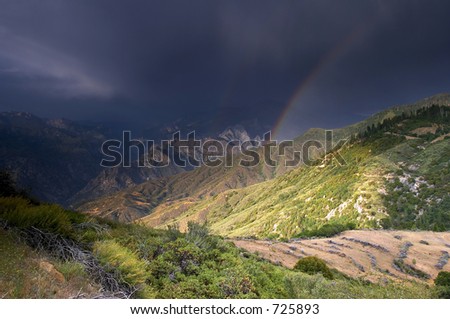 Rainbow after the storm in the mountains of Kings Canyon national Park