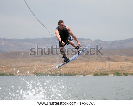 Young Man Catching Air on a Wakeboard