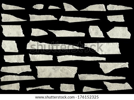 Strips of masking tape isolated on black background