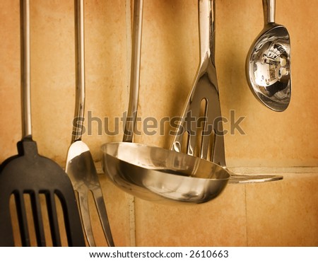 Set of tools hanging on the kitchen wall