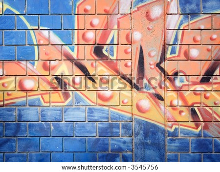 Grunge brick wall with colorful graffiti