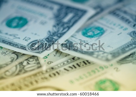 US dollars background. Close up photo with shallow DOF and space for your text