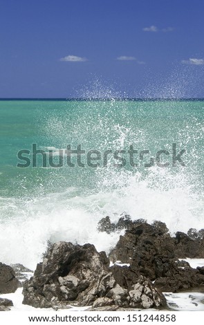 waves breaking on the rocks