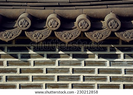 Oriental Wall; a brick wall in oriental style with roof element on top