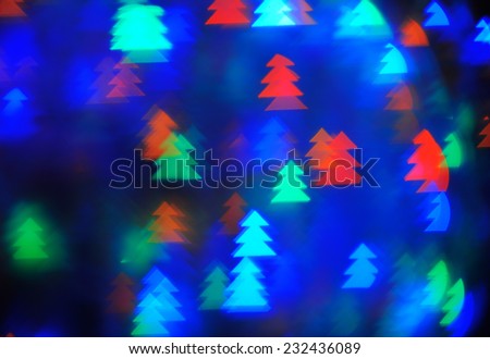 Christmas Sparkles; a set of blurred multicolored lights in some kind of Christmas tree style