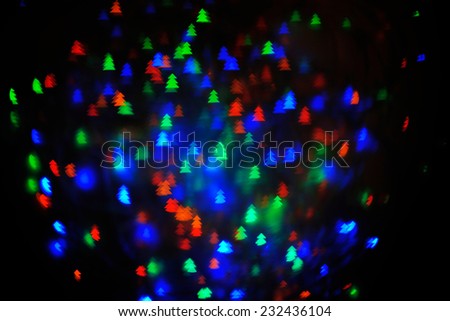 Christmas Sparkles; a set of blurred multicolored lights in some kind of Christmas tree shape