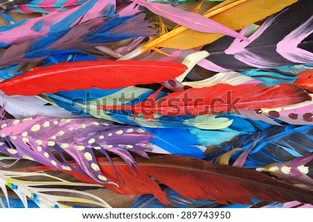 Colored Feathers on Sackcloth