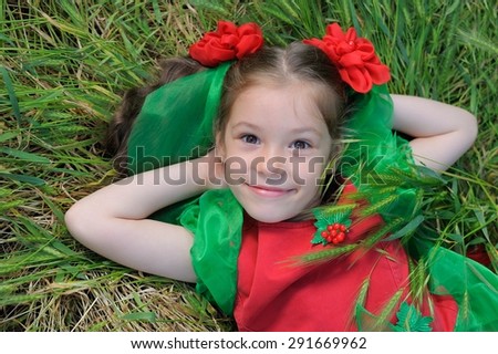 Little Elf Girl; a little girl in elvish-styled fancy costume outdoors