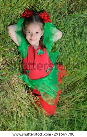 Little Elf Girl; a little girl in elvish-styled fancy costume outdoors