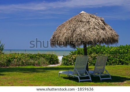 Tropical beach setting with a place to sit and watch