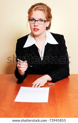 Businesswoman giving you the pen and the contract to sign